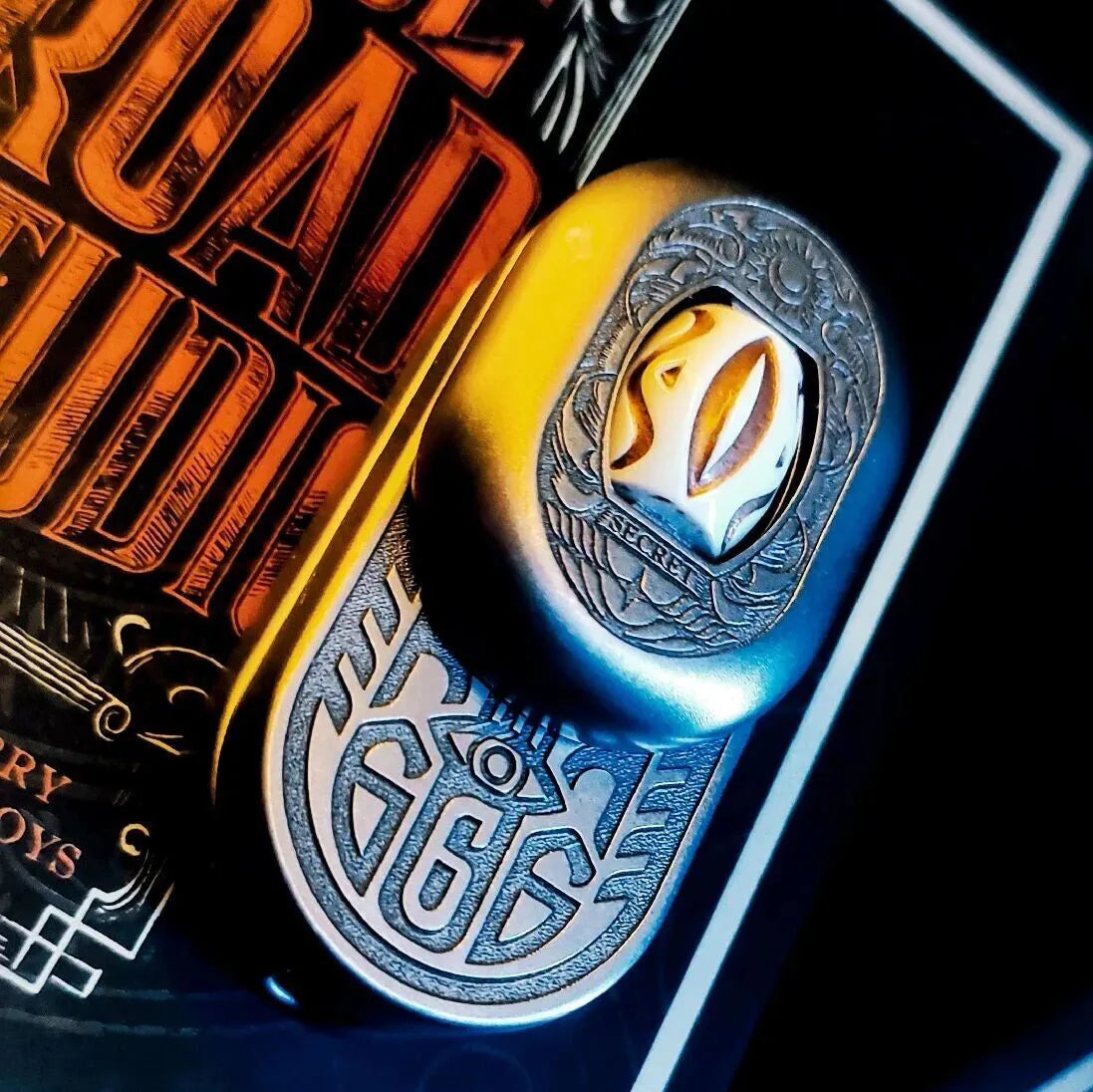 Answer Slider titanium fidget slider inspired by the Eye of Truth