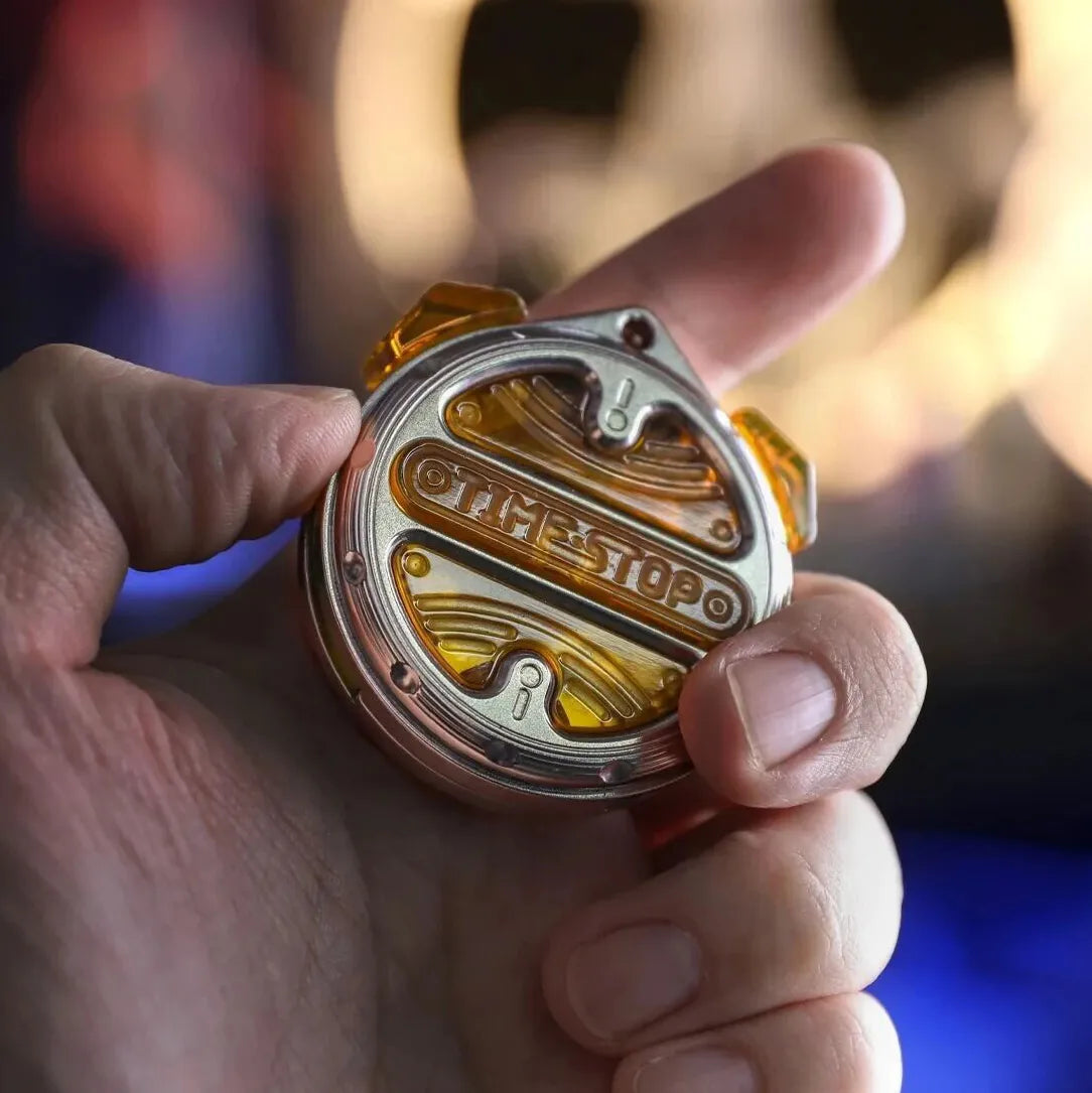     Titanium EDC slider with rotating mechanical handles